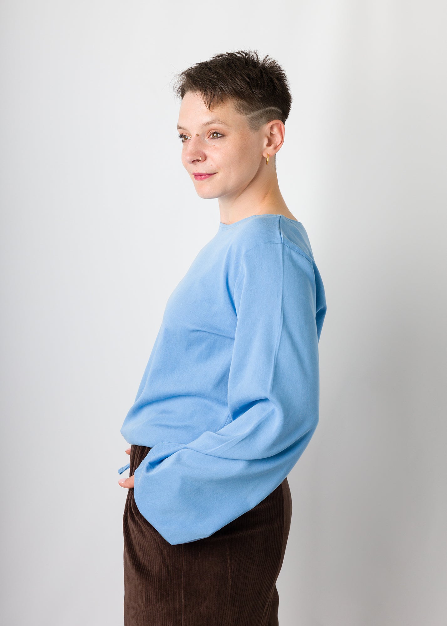 Melly trägt auf dem Foto 'Greta' Größe S, Tenceltwill babyblau